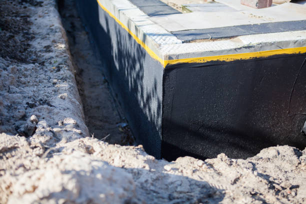 Professional Emergency Waterproofing technician working in Point Pleasant, PA